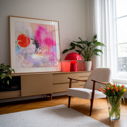 Large framed abstract art print in a retro style livingroom 