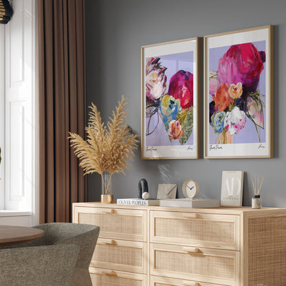 Dining room with a wooden sideboard, decorative plants, and colorful abstract art on the wall.
