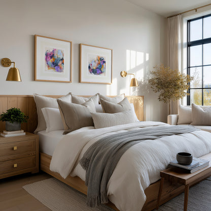 Neatly made bed in a bedroom with decorative elements.