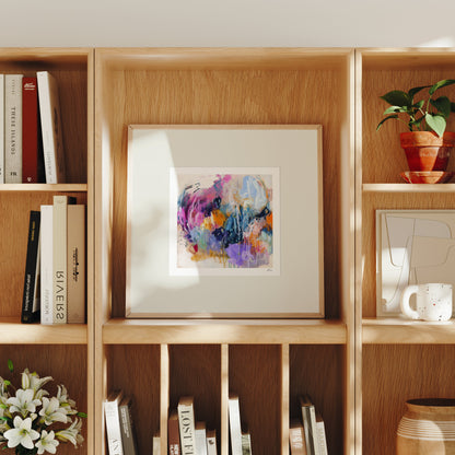 Wooden bookshelf with books, a colorful painting, and decorative items.